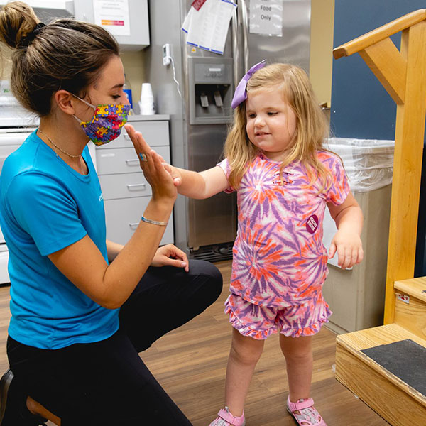 Mary Free Bed at Covenant therapist and pediatric patient